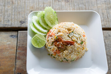 Shrimp fried rice with vegetable on wood table background.Thai food - 355906830