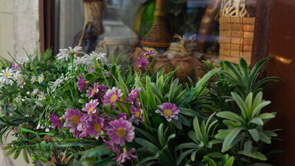Fototapeta na wymiar Flower Street, Beautiful flowers on the shop window