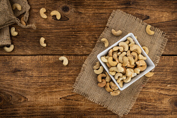 Roasted Cashew Nuts (close up shot; selective focus)