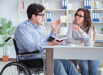Disabled student studying and preparing for college exams