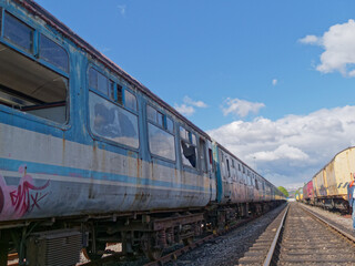 Fototapeta na wymiar Graffiti and vandalism on old abandoned train carriages, on the East Lancashire Railway.