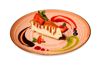 Cheesecake with strawberries on white background