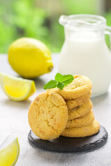 Homemade freshly baked citrus cookies with lemon and white chocolate. Dessert for gourmets. Selective focus