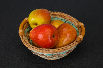 Pear heap in the wooden basket