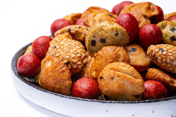 Tasty asian vegetarian appetizer, crunchy rice en peanuts snacks from Japan close up on white backgound