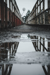 Water puddle reflection on a pedestrian Walking bridge