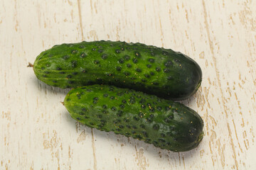 Ripe fresh green two cucumbers