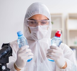 Lab assistant testing water quality