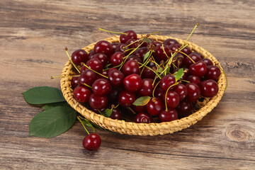 Sweet ripe cherry with leaves
