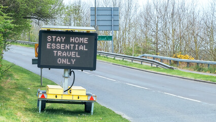 Travel ban traffic sign for essential travel only due to the Covid-19 Coronavirus lockdown