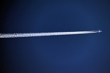 an airplane cruising at the maximum speed in the sky