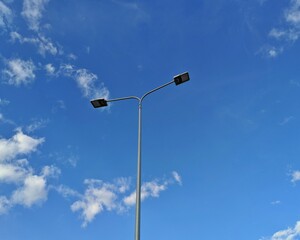 lamppost on background of blue sky