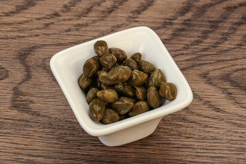 Tasty capers in the bowl