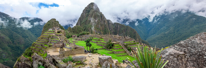 Machu Picchu, a Peruvian Historical Sanctuary and a UNESCO World Heritage Site. One of the New Seven Wonders of the World - obrazy, fototapety, plakaty
