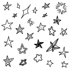 Set of black hand drawn doodle stars in isolated on white background.