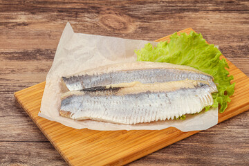 Herring fillet with salad leaves