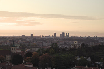 Fototapeta na wymiar Dawn over Prague. The urban skyline of an ancient European city at dusk.