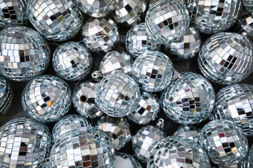 Set of small mirror disco balls ready for the party. Details for event decoration, greeting card...