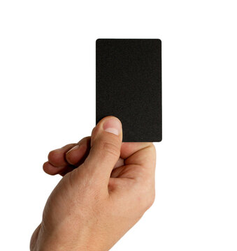 Hand holding up a blank black card
