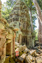 Buildings Details and Rubble at the Ruins of Ta Prohm Temple at Angkor Wat Siem Reap Cambodia