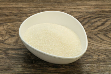 White sugar in the bowl