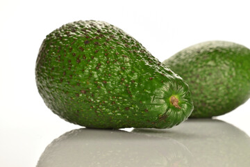 Juicy, ripe, organic avocados, close-up, on a white background.