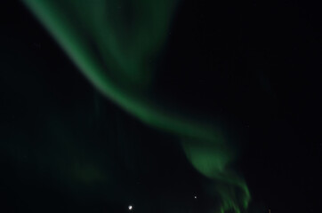 majestic aurora borealis on dark star filled night sky background