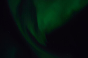 majestic aurora borealis on dark star filled night sky background