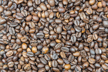 Coffee beans photographed as a solid texture background.