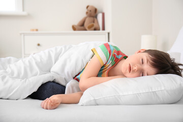Obraz na płótnie Canvas Morning of little boy sleeping in bed