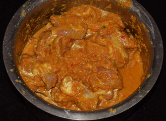 Raw fresh lamb or mutton meat marinated before cooking