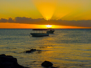 Fototapeta na wymiar Sunset on the Indian Ocean in Grand Baie, Mauritius Island