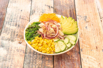 Hawaiian Poke Bowl on wooden table