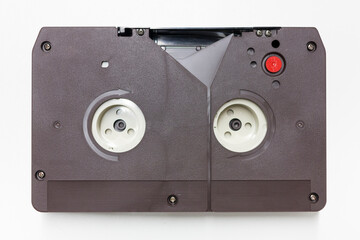 U-matic analogue videocassette. This videotape format was first released in 1971 and was among the first videotape formats to be introduced inside a cassette.