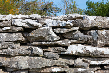Close up of a stone wall fence in Faro Island, Sweden. 