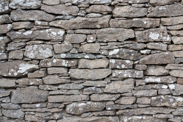 Close up of a stone wall fence in Faro Island, Sweden. 