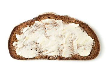 A slice of black rye bread spread with butter on a white background. Isolated object, a concept for culinary design.