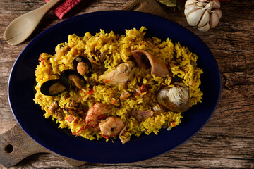 La paella, ​ o arroz a la paella, ​ ​es una receta de cocina con base de arroz, con origen en la Comunidad Valenciana, hoy en día muy popular en toda España y también en otros países como Argentina.