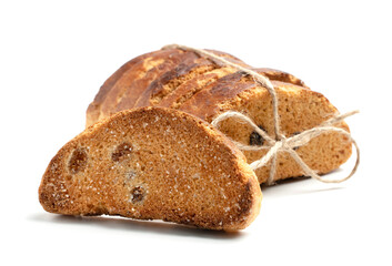 Sweet rusks with raisins sprinkled with sugar on a white background. Isolated image, a concept for your design.