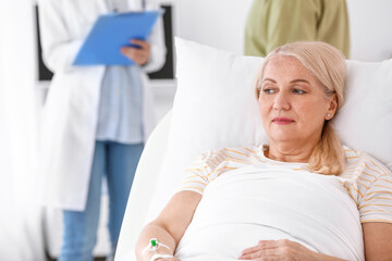 Fototapeta premium Mature woman in hospital room