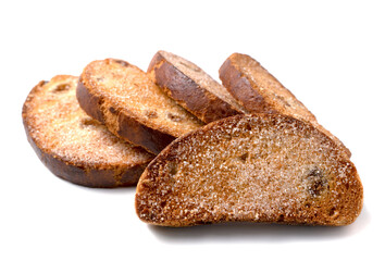 Sweet rusks with raisins sprinkled with sugar on a white background. Isolated image, a concept for your design.