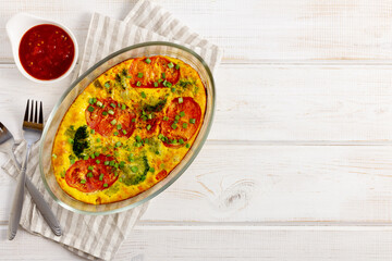 Casserole with broccoli and vegetables in baking dish