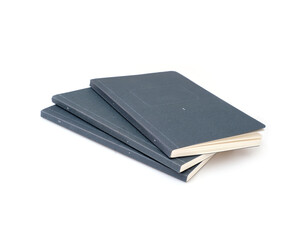 Stack of books in colour covers with white sheets isolated on a white background