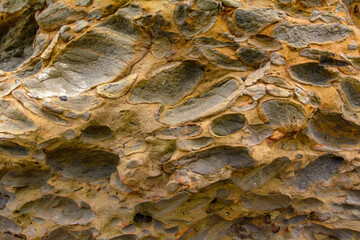 rocks with lots of texture at the shore