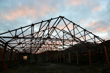 Fototapeta premium Derelict warehouse at Sunset