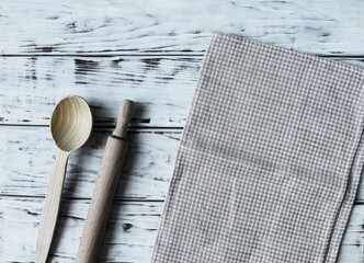 Spoon rolling pin and towel jn white boards