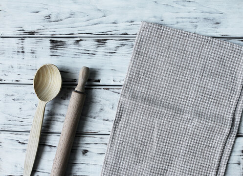 Spoon rolling pin and towel jn white boards