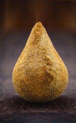 fried, unhealthy, homemade food. Fried and breaded chicken thigh, typical of Brazil.