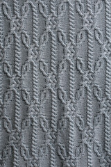 Cool grey color knitted textured textile background