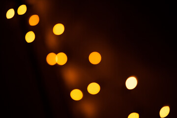 Warm fairy lights (festive holiday lights). Out of focus (bokeh/defocused) lights